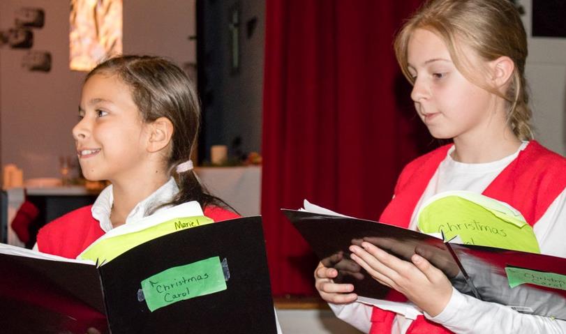 Children perform Charles Dickens A Christmas Carol