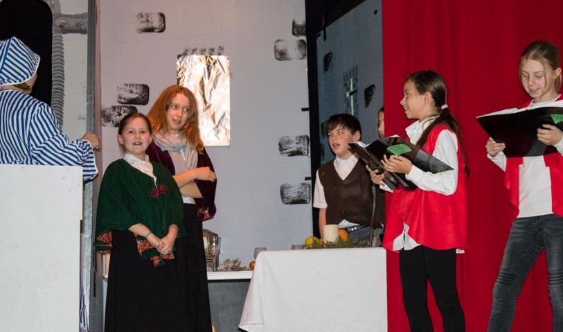 Student perform ArtReach's Christmas Carol play
