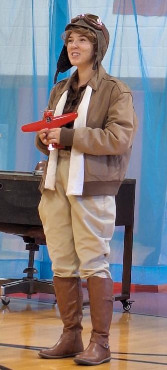 Amelia Earhart talks to audience