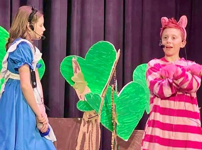 Kids perform Alice in Wonderland play