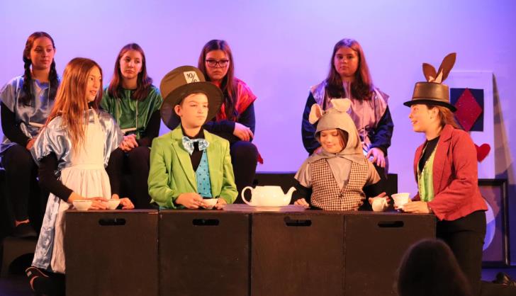 Alice in Wonderland Kids perform