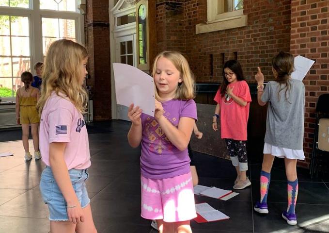 Children rehearse ArtReach's Alice in Wonderland