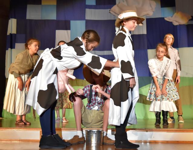 Two kids play cow in Jack and the Beanstalk Musical