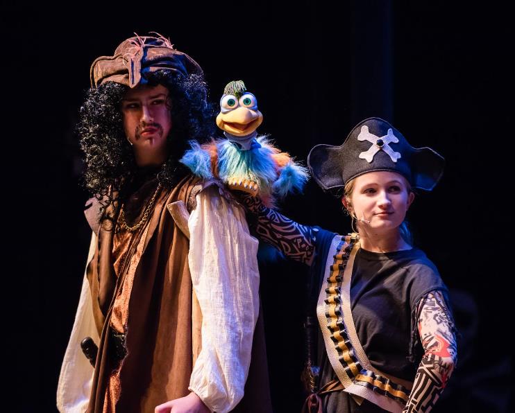 Kids Ply Pirates in Treasure Island Play